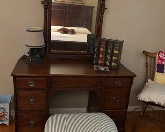 Stripe padded vanity ottoman. 