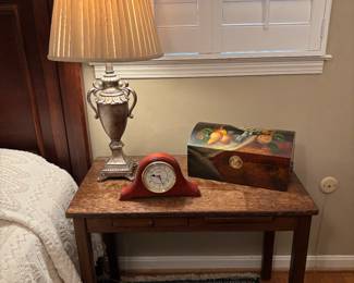Antique side table with drawer and slide out.   Fruit painted box 14 1/2" x 9 1/4" x 3 1/2" 7 in high.  Seth Thomas battery operated clock. Urn style lamp. Also the area rugs are for sale too. 