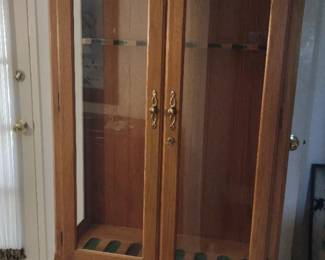 Ethan Allen wooden gun cabinet, designed for storing firearms