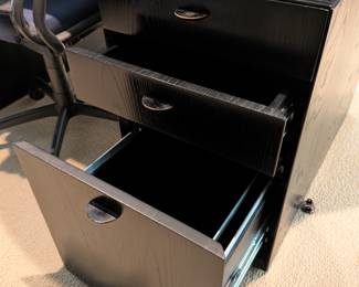 FILING CABINET BENEATH RIGHT SIDE OF DESK (ATTACHED)
