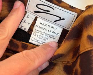 DETAIL OF ITALIAN DESIGNER OF ANIMAL PRINT SKIRT