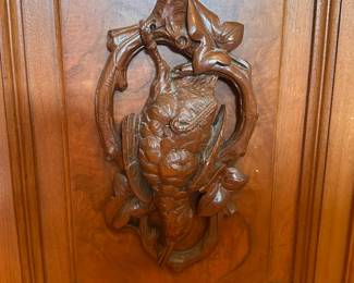 Walnut, white marble top, Victorian sideboard; approx. 71" wide by 21" deep by 41" high. Two center drawers over two doors swing side drawers over side doors. Carved and applied fruit and leaves on side pillars; also carved and applied game cocks on burled center panels of front doors. All drawers and doors have the Victorian tear-drop pulls. The marble top has two drilled holes in it each side that most likely held a shelf or mirrored back. C-1865. This piece was purchased from the Wadsworth Estate in Geneseo, NY. 