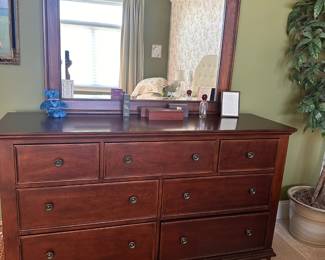 7-drawer dresser  66"w 20"d 40"h with mirror 49" x 37".   Matching nightstands (2) also available.