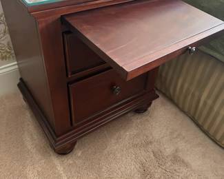 Pair of nightstands, 2 drawers and pull out writing surface, glass top and bun feet.  20"w 17"d 27"h.