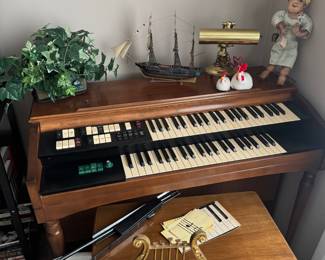 vintage organ and neat harp wall hanging
