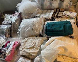 linens galore, from sheets to blankets