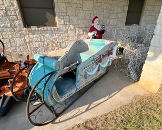 Vintage fiberglass sleigh with sitting Santa (not pictured) 