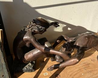 Large size bronze nude couple with a a glass table top