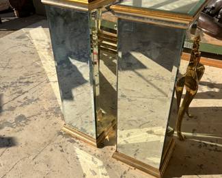 Pair of mirrored and brass columns