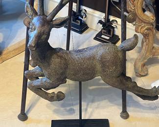 Sweet deer bronze on pole