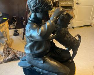 Boy and dog, large bronze sculpture
