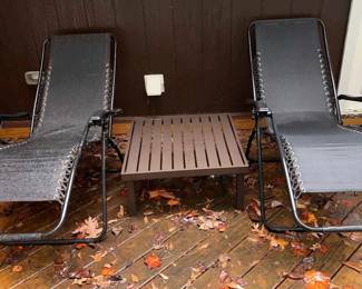 Two Lounge Chairs A Small Table