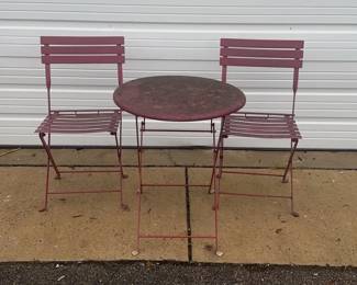 Red Metal Table With Chairs