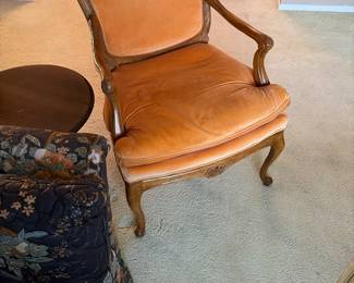 We have two orange velvet chairs 
