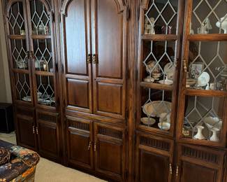 
Three-piece entertainment center with the middle  being a bar