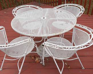 Mid century wrought iron nesting mesh top table and chairs with umbrella 