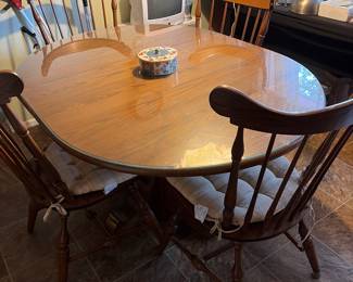 Kitchen table with glass over lay 