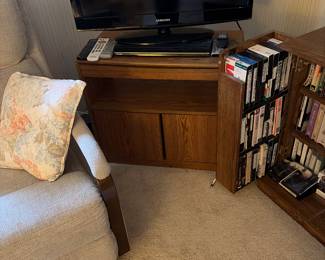 Cd cabinet with cds  tv. Tv stand 