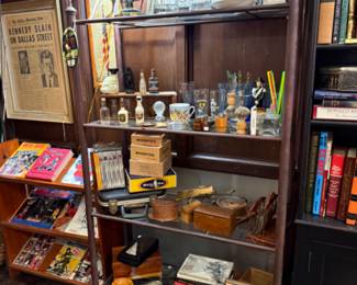 Metal book shelf with glass shelves , lots of collectibles