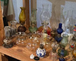 Antique oil lamp collection.