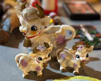 Vintage cow creamer, salt, and pepper.