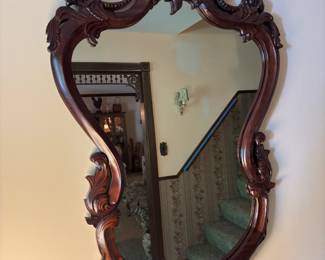 Ornate carved mirror