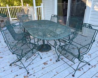 Wrought iron patio set with 6 chairs