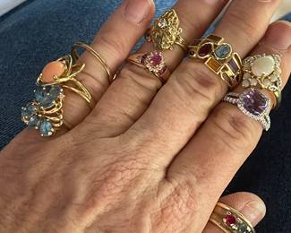 The ring on my thumb and the amethyst ring on my pointer finger the family took. All the remaining rings are 14K - please ask for prices.