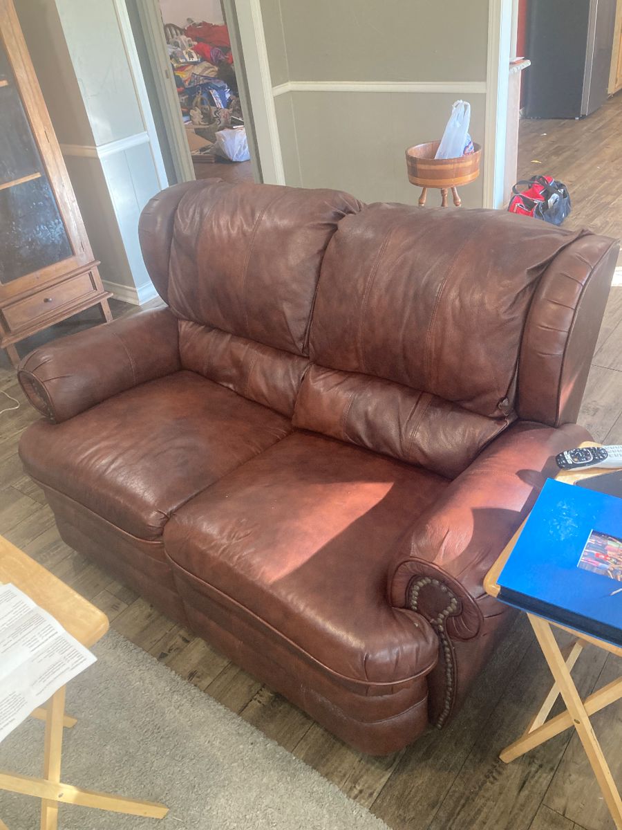 Leather reclining loveseat