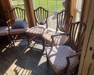There are five Hepplewhite style chairs in this sale