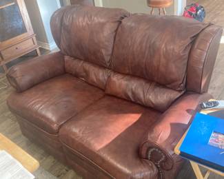 Leather reclining loveseat