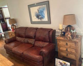 Handsome leather reclining sofa