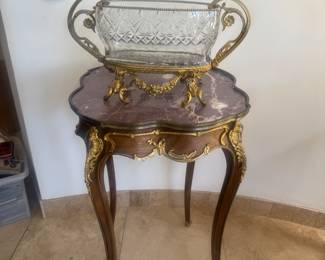 Louis XV side table with lavender marble 
And Baccarat bucket center table.