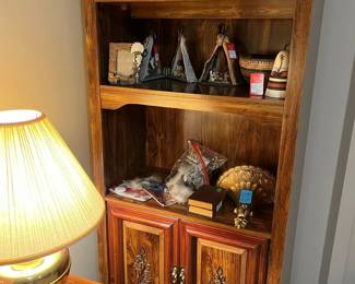 Book case, brass lamps, end tables, Indian decor