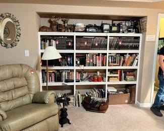 Leather recliner, vintage smoking stand, books