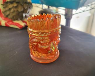 Vintage St. Clair Carnival glass toothpick holder with an Indian head design