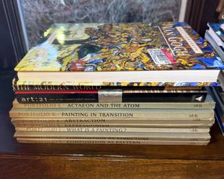 Art books and portfolios including Van Gogh, The Modern World, and series titles from Portfolio on painting and abstraction.