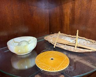 Decorative Stone Bowl, Canoe Model & Woven Disk Trio
Eclectic mix including carved stone bowl, miniature canoe, and woven decorative disk. Unique textures and artisan craftsmanship—great accent pieces.