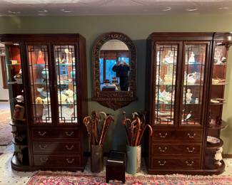 Elegant Mahogany Lighted China Cabinets & Mirror Set
Pair of matching mahogany display cabinets with beveled glass doors, drawers, and center mirror. Excellent condition—ideal for showcasing fine china or collectibles.