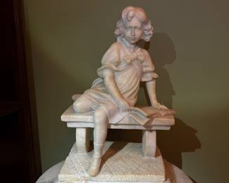 Antique Alabaster Sculpture of Child Reading
Charming carved alabaster statue depicting a young child seated with an open book. Beautiful detail and craftsmanship—timeless and elegant collectible.