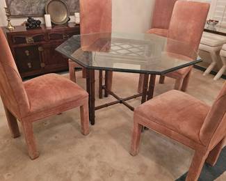 Stylish dining room table with velvet chairs
