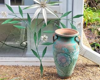 Vintage metal art and terracotta vase