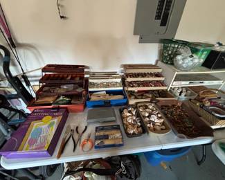 loads of art supplies, brushes, and tools