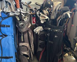 3 full golf caddies Golf clubs