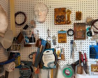 Plaster faces wall art