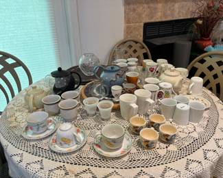 Random tea party table! Here's all of the mis-matched teacups and lonely tea pots needing good homes :)