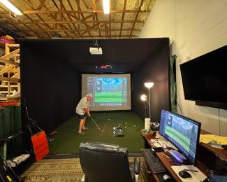 Uneekor Eye XO Golf Simulator.