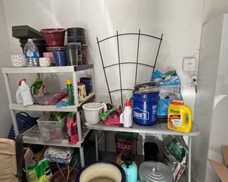 Variety of garden items, tables, and shelving
