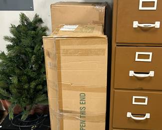 Christmas trees and antique  wooden filing cabinet