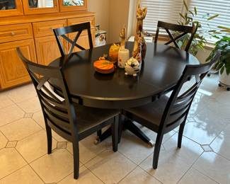 Elegant kitchen table with 4 chairs and leaf